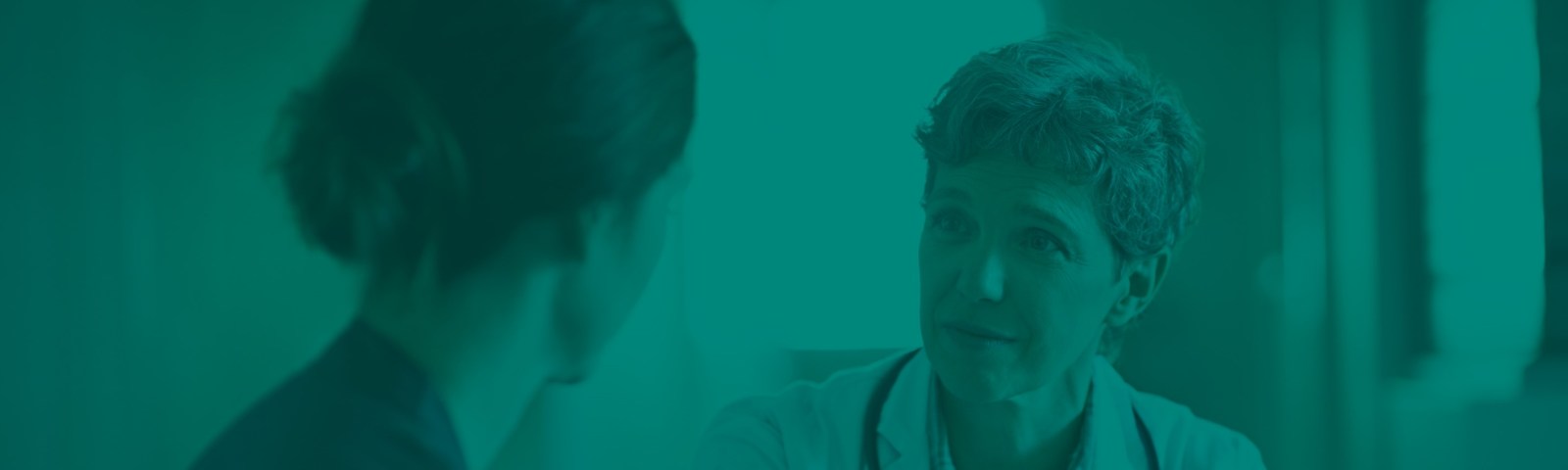 Image of a women doctor consulting her patient